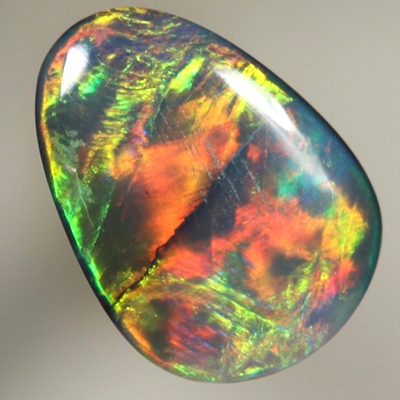 SOLID BLACK OPAL Very bright neon rainbow broad rolling flash 